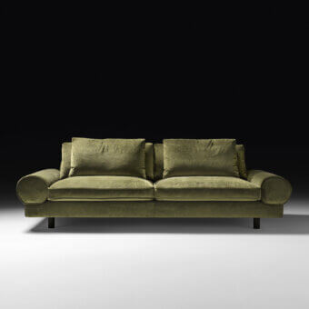 Distinguished Black Tie Sebastian sofa with enveloping shapes upholstered in textured muted olive green fabric and poplar wood construction