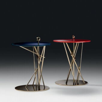 Lavish Black Tie Tao side table with red glass top and gold-toned woven stainless steel base