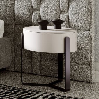 Distinctive Capital Aurea nightstand with circular silhouette and sleek metallic base crafted in matte off-white lacquer