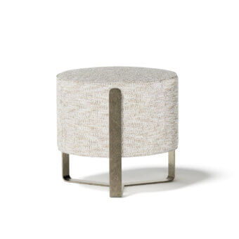 Elegant Capital Aurea ottoman with neutral beige textured fabric and subtle grayish-bronze metal accents crafted with a rounded silhouette