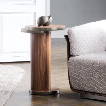 Exceptional Capital Celine side table crafted in wood with a glossy finish and delicate metal rings