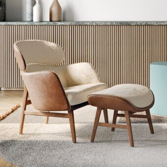 Distinguished Capital Dafne lounge chair with curved design and two-tone textile upholstery crafted in warm tan and creamy-beige hues