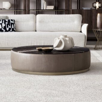 Elegant Capital Étoile coffee table with dark gray-black veined marble and neutral beige leather-wrapped base