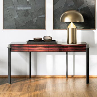 Elegant Capital Mayfair console with a glossy reddish-brown striped pattern and sleek matte black metal legs crafted in Italy