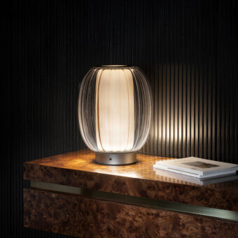 Distinguished Contardi Alma lamp crafted in translucent beige blown glass with brushed satin-finish metal exhibiting balanced proportions