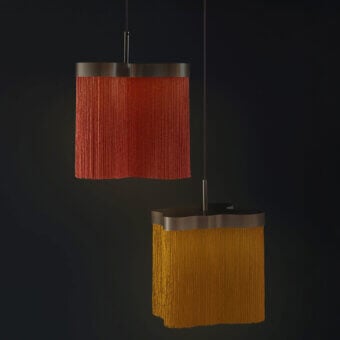 Distinguished Contardi Arcipelago suspension lamp with reddish-orange Trevira CS fringes and satin bronze frame