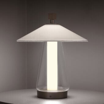 Distinctive Contardi Asia table lamp with a sleek form and white textile shade crafted in glass and dark satin-finish metal