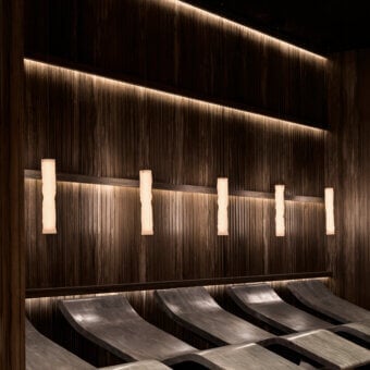 Distinguished Contardi Baggy Vertical suspension lamp crafted in textured matte wood with a double-satin polycarbonate diffuser