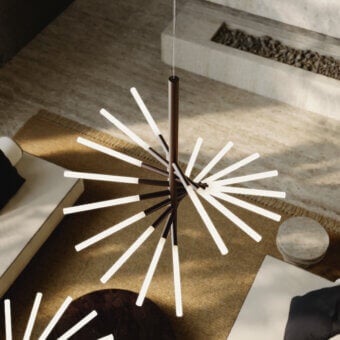 Elegant Contardi Bianca Twist suspension lamp crafted in steel with dark bronze finish and radiating milky white glass arms