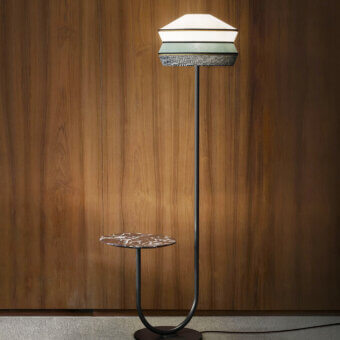 Distinguished Contardi Calypso floor lamp with a matte black metallic stem and geometric lampshade in black and white translucent textiles
