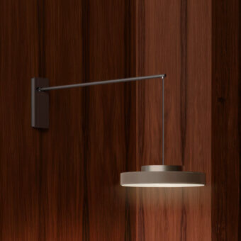 Elegant Contardi Discus rotating wall lamp with dark gray metal and opaline diffuser offering directional illumination