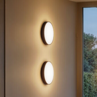 Exceptional Contardi Discus wall lamp crafted in metal with matte finish and white opaline diffuser