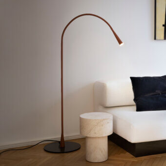 Refined Contardi Flexiled floor lamp crafted in brass with a satin finish and warm reddish-brown tone for comfortable illumination