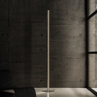 Architectural Contardi Fly floor lamp in warm gold with satin metal crafted for dual illumination and integrated touch control