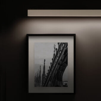 Superior Contardi Fly Picture lamp with white form and matte metal crafted in Italy emitting diffused light
