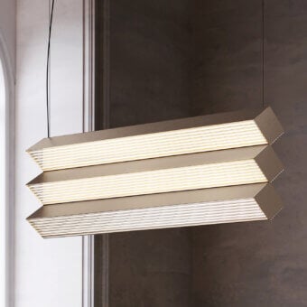 Distinguished Contardi Stick Trio suspension lamp crafted in sleek metal with a satin muted gold finish