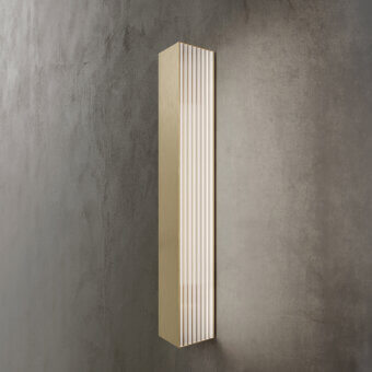 Distinguished Contardi Stick Wall Lamp crafted in wood with a satin finish delivers a pale gold ribbed effect through architectural form