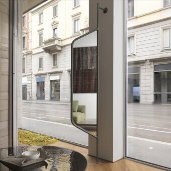 Distinguished Horm Bebel mirror with slender painted metal structure and integrated shelves embodies Italian savoir-faire in a matte dark finish