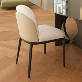 Distinguished Horm Piccadilly chair with light beige fabric upholstery, a solid wood structure and dark-toned matte metal frame