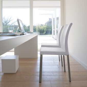 Superior Ivano Antonello Italia Barby dining chair crafted in white synthetic material with sleek metal legs