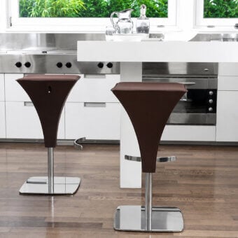 Distinguished Ivano Antonello Italia Flut bar stool with rich brown textile upholstery and polished steel frame