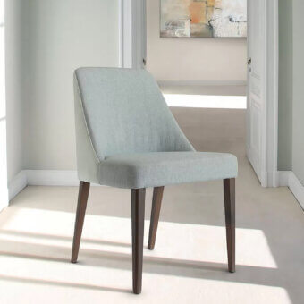 Distinguished Ivano Antonello Italia Ketty dining chair crafted with wood and pale blue-green woven fabric in a satin finish