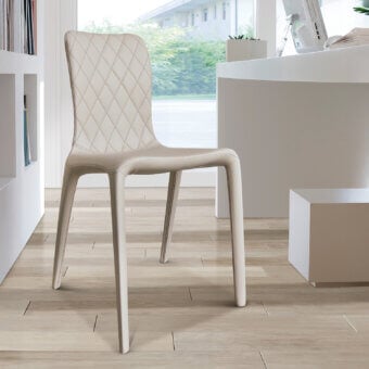 Superior Ivano Antonello Italia Malika dining chair with quilted detail in light beige synthetic leather and steel frame