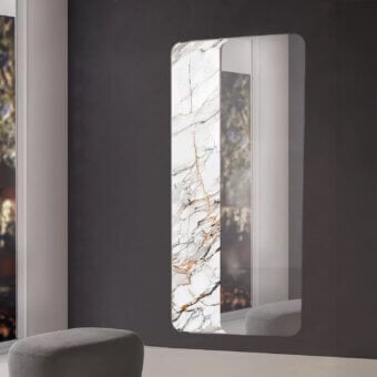 Superior Ivano Antonello Italia Monolito mirror with organically curved form and Calacatta Lux ceramic detail in glossy finish