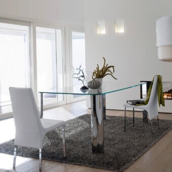 Distinctive Ivano Antonello Italia Scott dining table with clear tempered glass and polished silver aluminum base