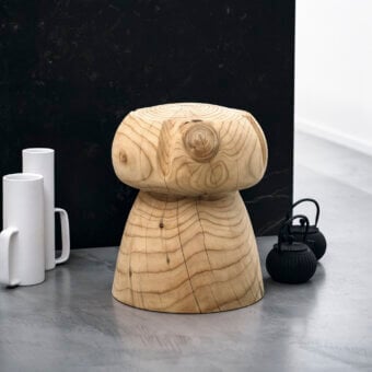 Distinguished Riva 1920 Miss Champagne ottoman crafted from Cedar of Lebanon with organic form and textured wood grain
