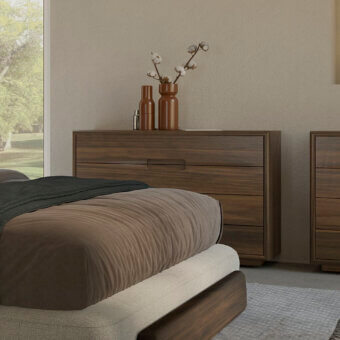 Exceptional Riva 1920 Sospiro dresser crafted in medium-toned brown solid wood with satin finish and shaped recessed handles