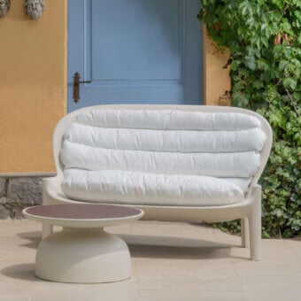 Distinctive Serralunga Balzac sofa with curved form molded in recyclable LLDPE plastic and smooth matte finish