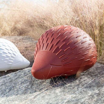 Exceptional Serralunga Bonnie sculpture crafted in reddish-brown LLDPE with matte granular finish and integrated wireless lighting