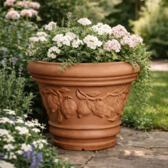 Superior Serralunga Decorati Limoni planter with terracotta color and lemon detailing crafted in durable LLDPE plastic