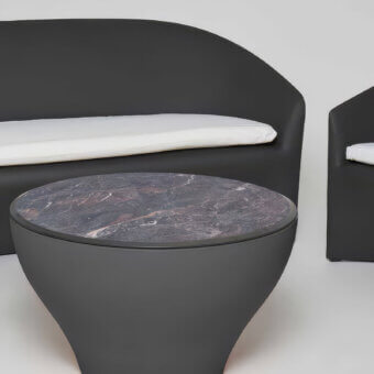 Elegant Serralunga Drum coffee table crafted in dark gray recyclable LLDPE with a Black Marble high-pressure laminate tabletop