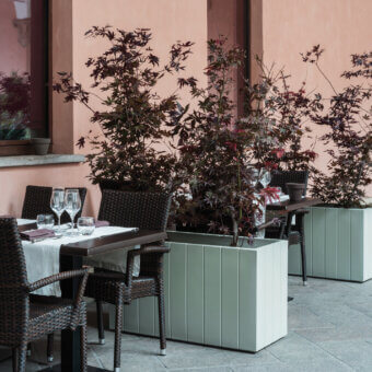 Exceptional Serralunga Fence planter, a planter crafted in light grey recyclable LLDPE with a subtly textured matte finish