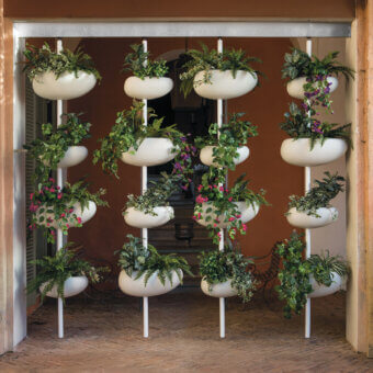 Distinguished Serralunga Greenpills vertical planter with recyclable LLDPE and glossy white finish