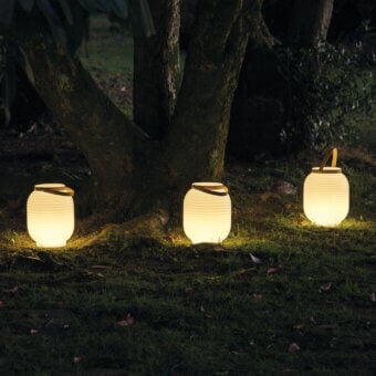 Elegant Serralunga Honey Lantern, portable lighting crafted in neutral translucent LLDPE plastic with an opal finish and sleek leather handle