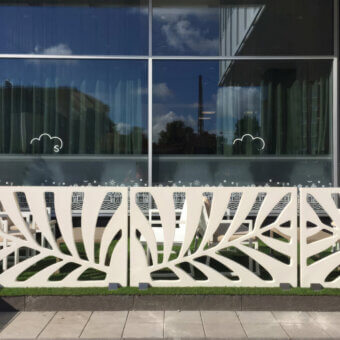Superior Serralunga Kentia Panel Divider crafted in light cream recyclable LLDPE with a matte finish