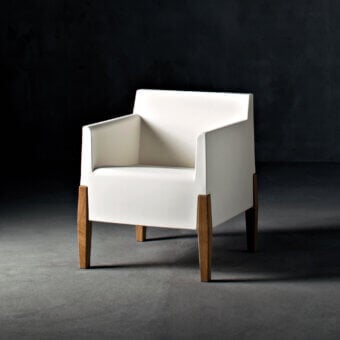 Exceptional Serralunga Kubrick lounge chair crafted in recyclable LLDPE with satin Iroko wood legs