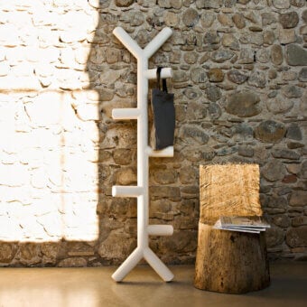 Distinguished Serralunga Ramo coat stand crafted in recyclable LLDPE with a smooth, matte, off-white finish presents an organic form