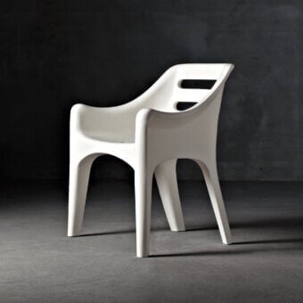 Distinctive Serralunga Russel armchair built in pale LLDPE with open-cell polyurethane and polyolefin fabric, showcasing a smooth matte finish