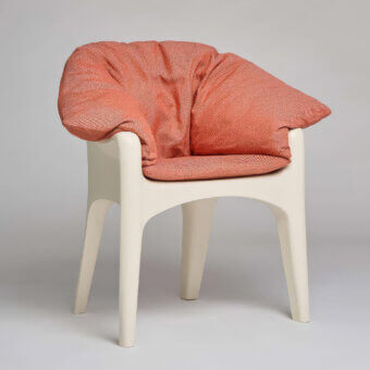 Distinguished Serralunga Russel armchair crafted in pale cream LLDPE with comfortable polyolefin cushion and terracotta upholstery