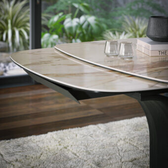 Captivating Tonin Casa Arco Ext table with a marble-effect ceramic tabletop and dark-stained sculpted wooden base