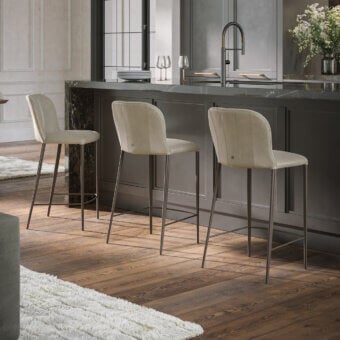 Distinguished Tonin Casa Bustier stool with light beige fabric upholstery and smooth silver-grey powder-coated metal frame