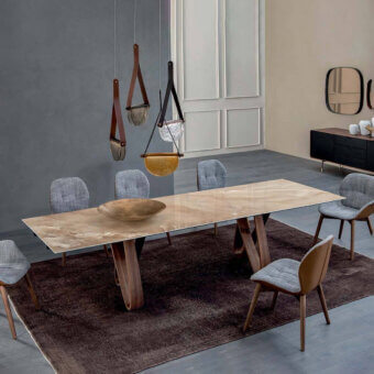 Elegant Tonin Casa Butterfly Ext table built in travertino with grey veining and a glossy polished finish