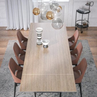 Captivating Tonin Casa Butterfly Ext table built in travertino with polished light beige and natural veining