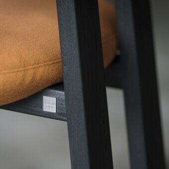 Superior Tonin Casa Camila chair with earthy brown textile upholstery and dark matte solid wood frame