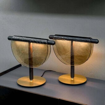 Exceptional Tonin Casa Dali lamp with amber fused glass shade and golden brass-like metal base crafted with recessed lighting