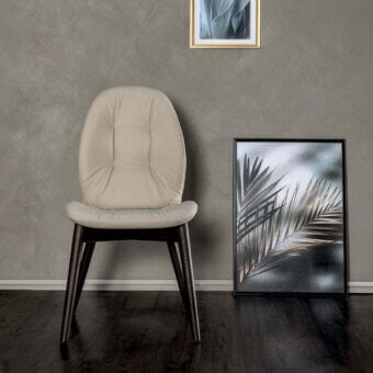 Exceptional Tonin Casa Sorrento chair crafted in Italy with beige synthetic upholstery and satin-finished wood frame